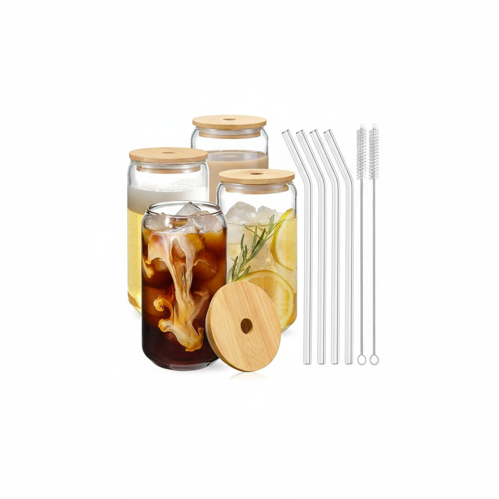 Set of glass jars with wooden lids, iced drinks, lemons, and straws on a white background